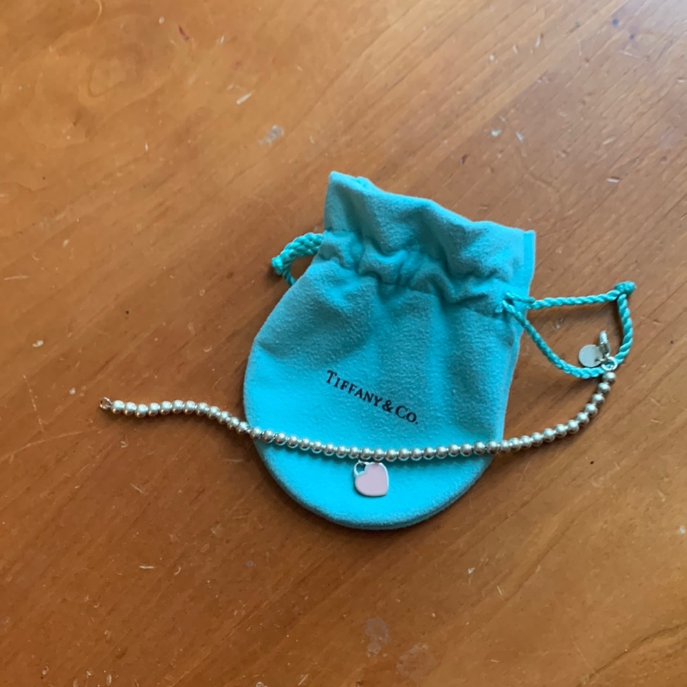 Tiffany silver bracelet with pink heart tag